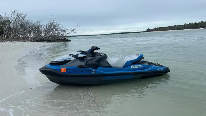 a small boat in a body of water