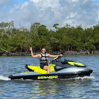 a man rowing a boat in the water