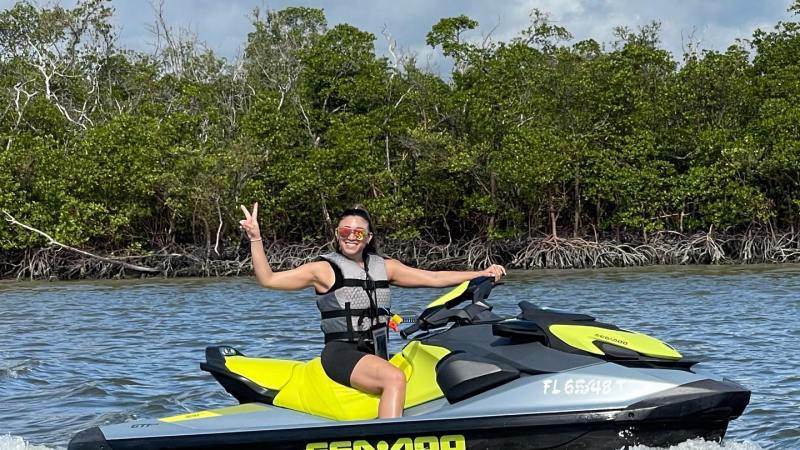 a man rowing a boat in the water
