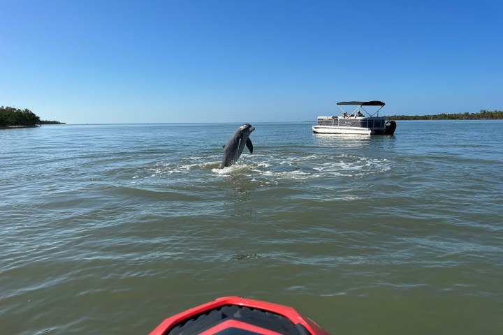 a small boat in a body of water
