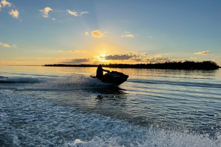 a sunset over a body of water